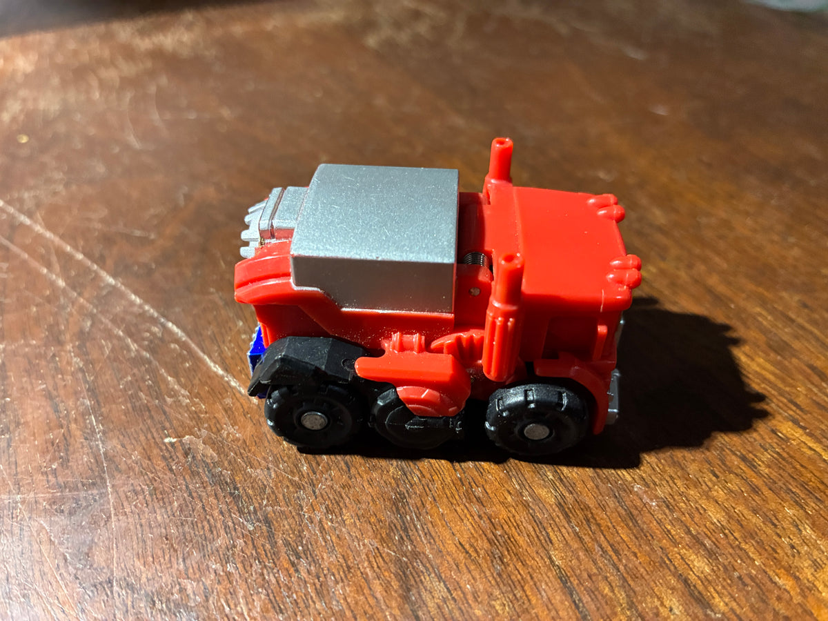 TF Bot Shots Optimus Prime Dragon Track