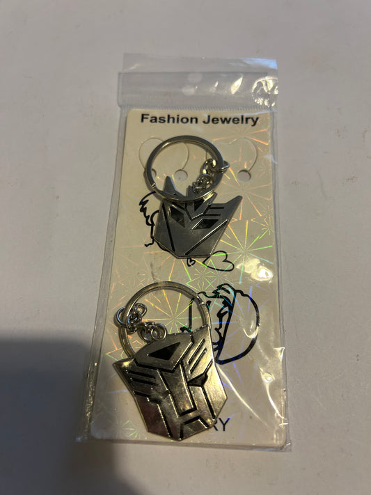 TF Autobot & Decepticon logo keychain set - NEW
