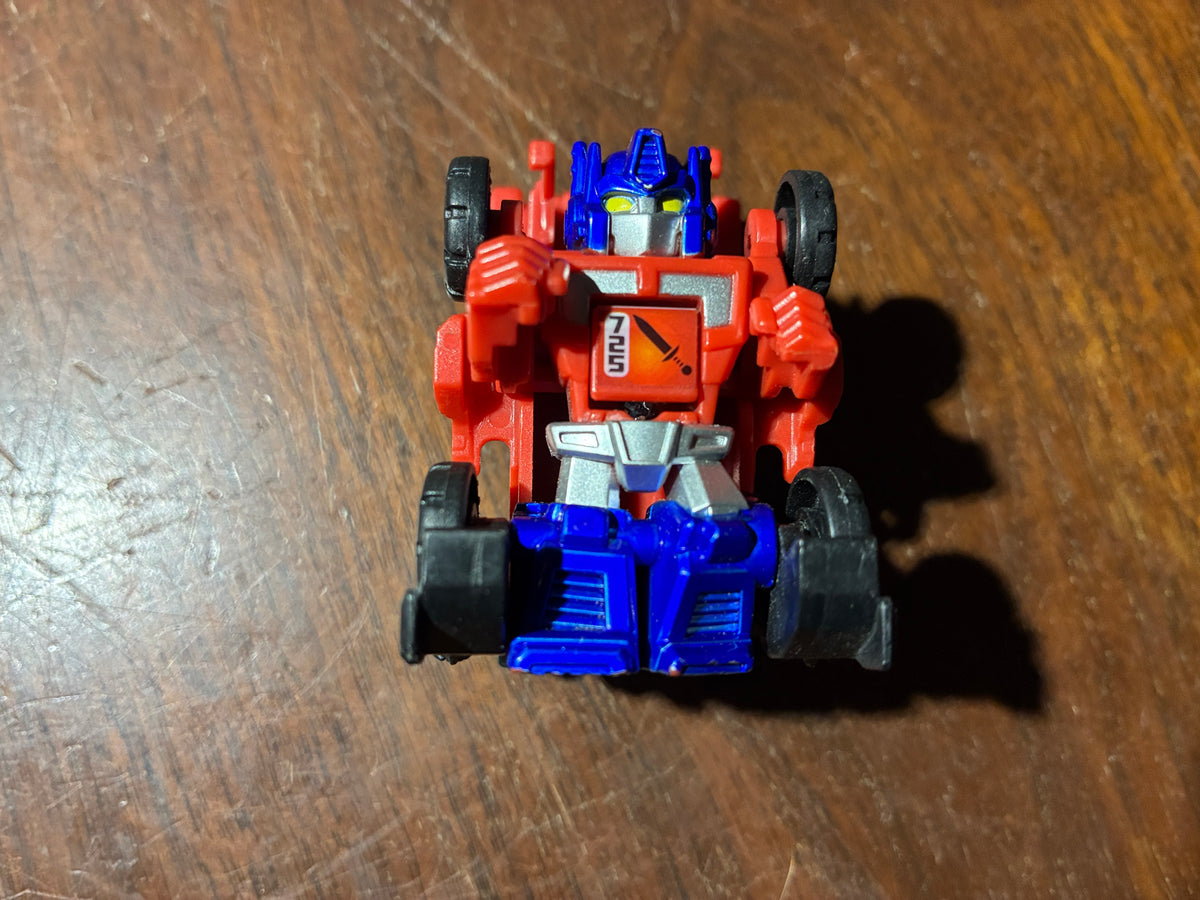 TF Bot Shots Optimus Prime Dragon Track